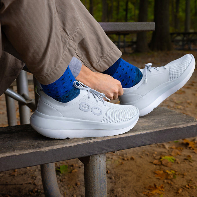 Explore OOFOS Men OOmy Stride - White / Glacier for trail, outdoor & lifestyle use | Liv Activ Singapore
