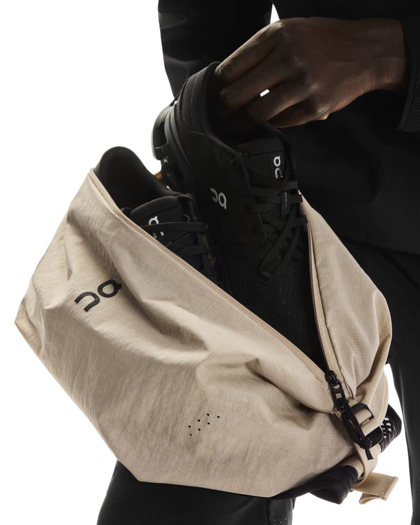 On Unisex Sling Pack 9L - Sand / Black