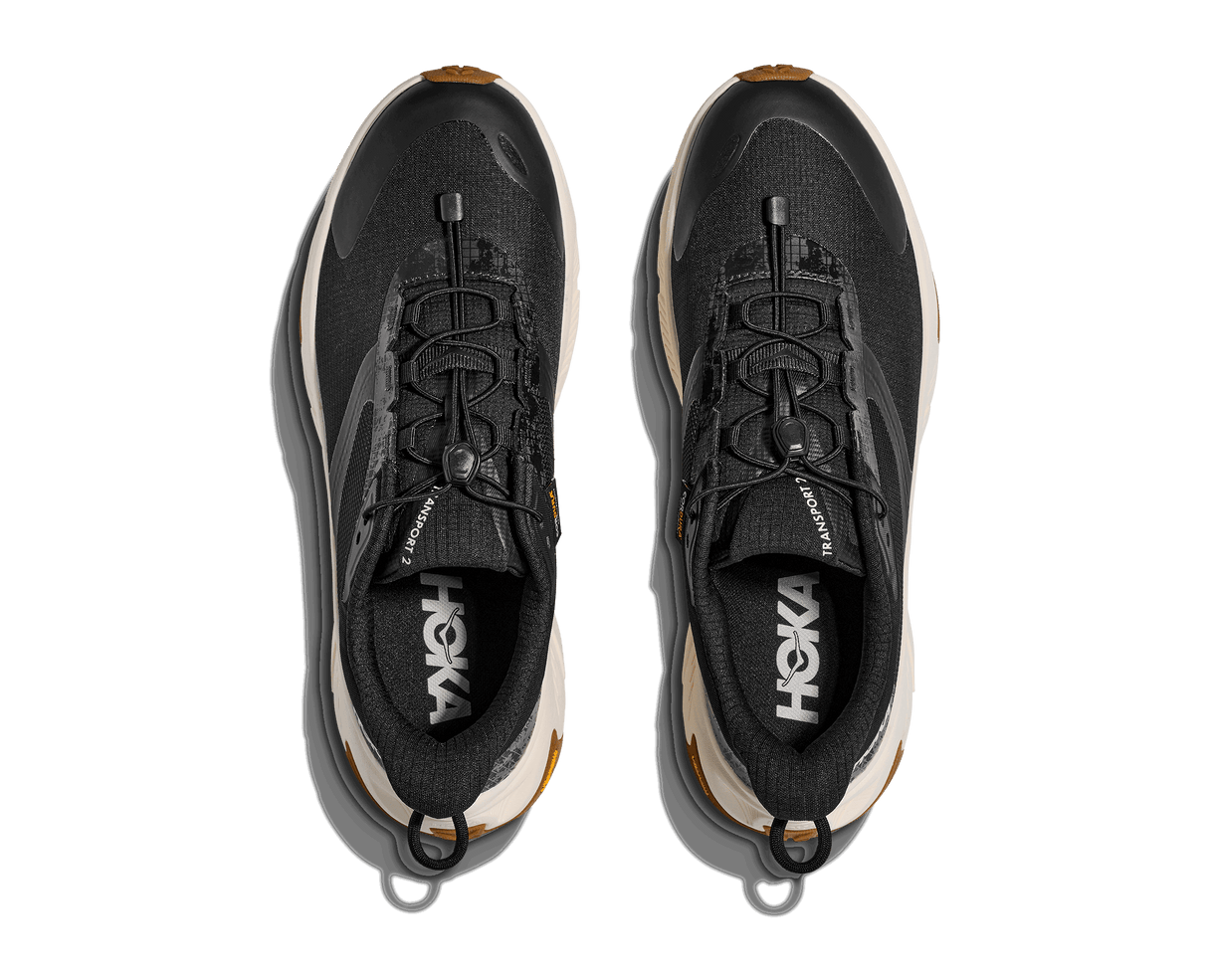 Explore HOKA Men Transport 2 Wide - Black / Alabaster for trail, outdoor & lifestyle use | Liv Activ Singapore