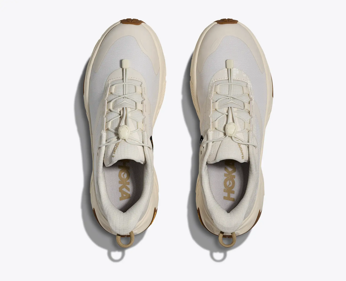 Explore HOKA Women Transport 2 Wide - Alabaster / Alabaster for trail, outdoor & lifestyle use | Liv Activ Singapore