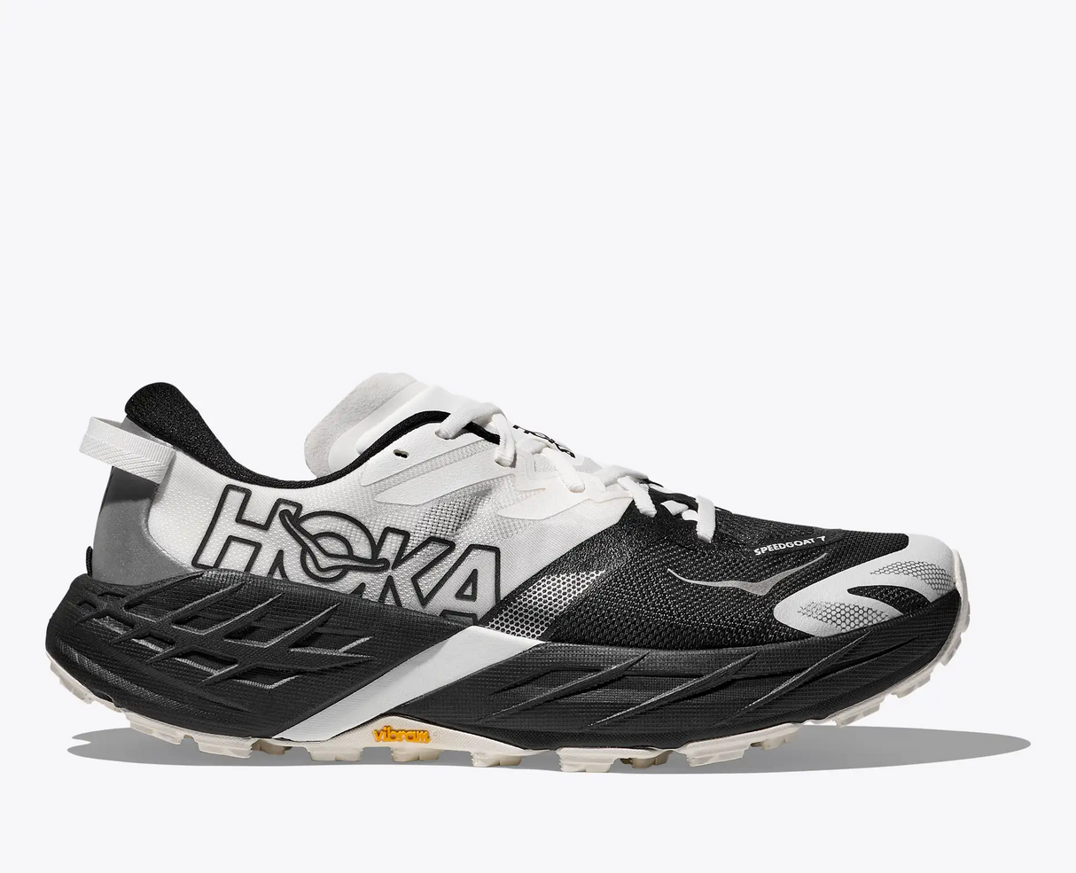 Explore HOKA Men Speedgoat 7 Wide - Black / White for trail, outdoor & lifestyle use | Liv Activ Singapore