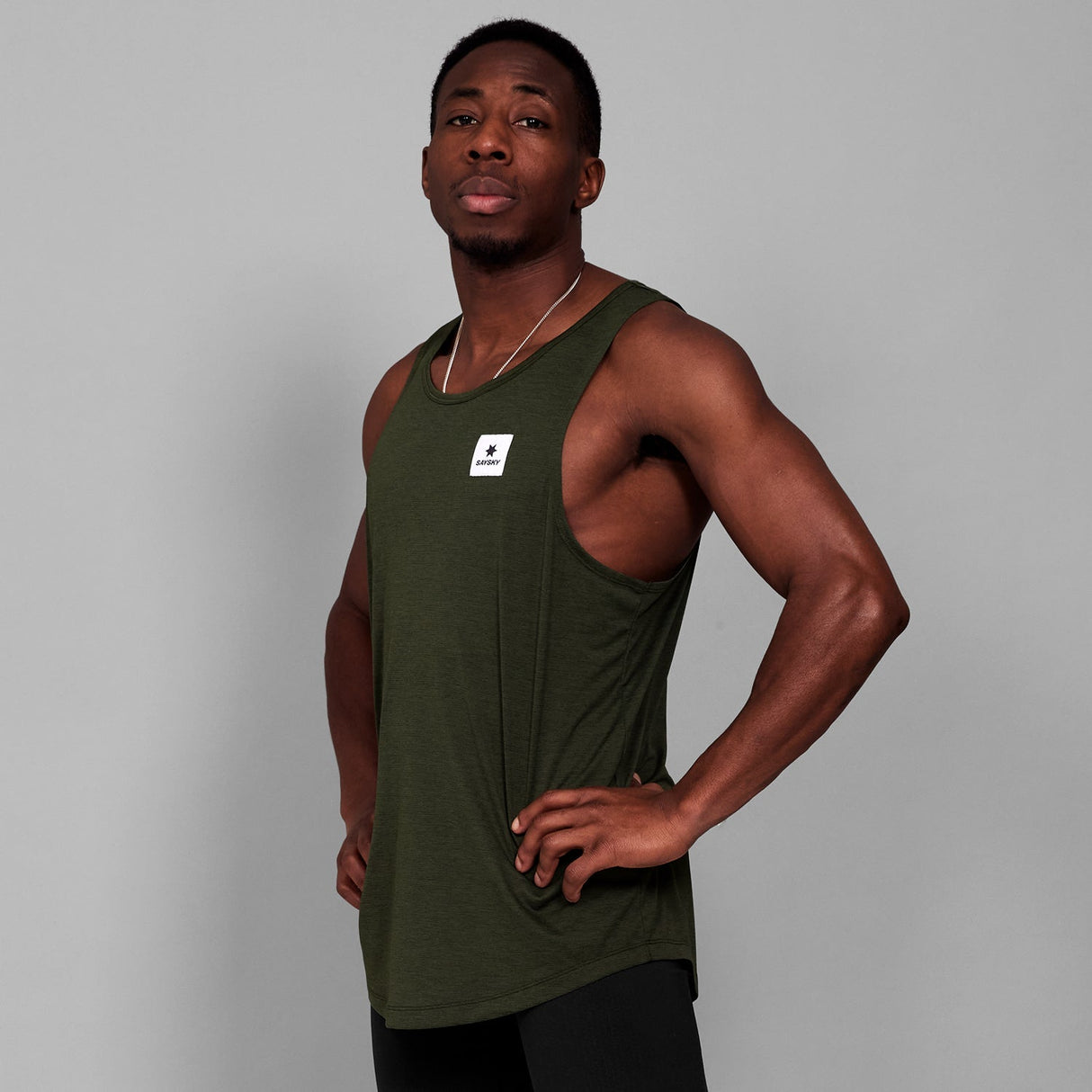 Explore SAYSKY Men Clean Combat Pro Singlet - Green for trail, outdoor & lifestyle use | Liv Activ Singapore
