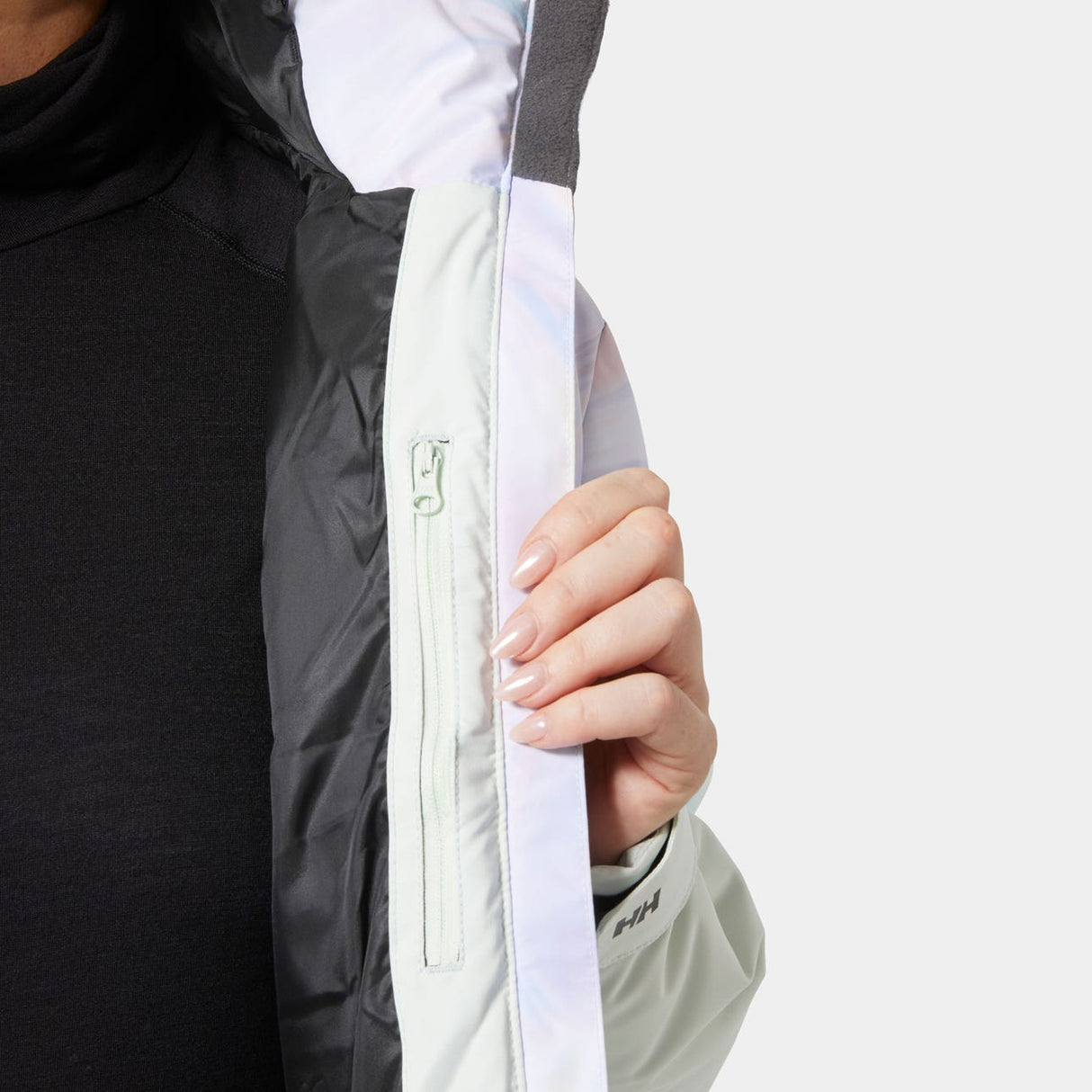 Explore Helly Hansen Women Nora Short Puffy Ski Jacket - Reflections AOP for trail, outdoor & lifestyle use | Liv Activ Singapore