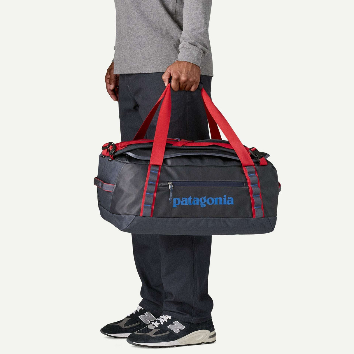 Explore Patagonia Black Hole® Duffel Bag 40L - Smolder Blue with Amanita Red for trail, outdoor & lifestyle use | Liv Activ Singapore