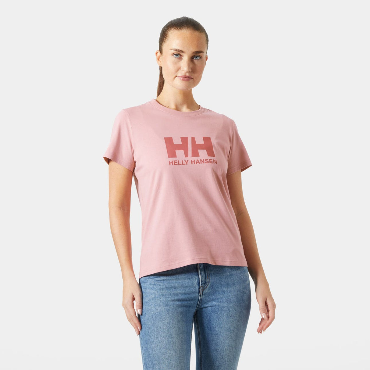 Explore Helly Hansen Women HH Logo T-shirt 3.0 - Pink Salt for trail, outdoor & lifestyle use | Liv Activ Singapore