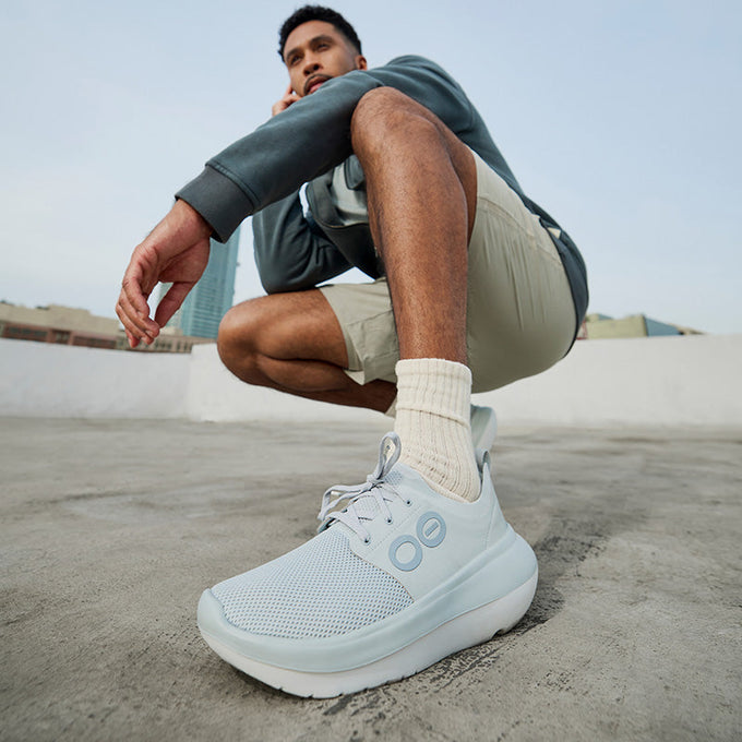 Explore OOFOS Men OOmy Stride - White / Glacier for trail, outdoor & lifestyle use | Liv Activ Singapore