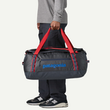Explore Patagonia Black Hole® Duffel Bag 55L - Smolder Blue w/Amanita Red for trail, outdoor & lifestyle use | Liv Activ Singapore