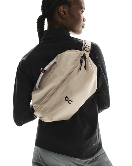 On Unisex Sling Pack 9L - Sand / Black
