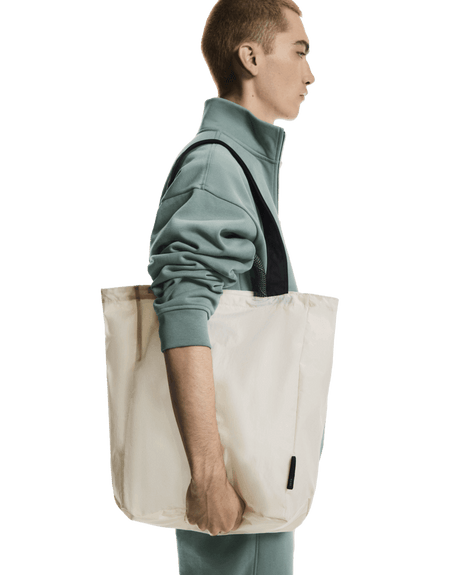 Explore On Unisex Tote Pack 25L - Cream / Black for trail, outdoor & lifestyle use | Liv Activ Singapore