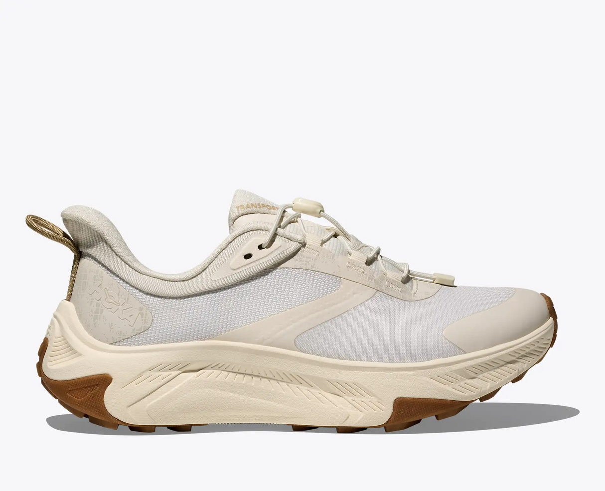 Explore HOKA Women Transport 2 Wide - Alabaster / Alabaster for trail, outdoor & lifestyle use | Liv Activ Singapore