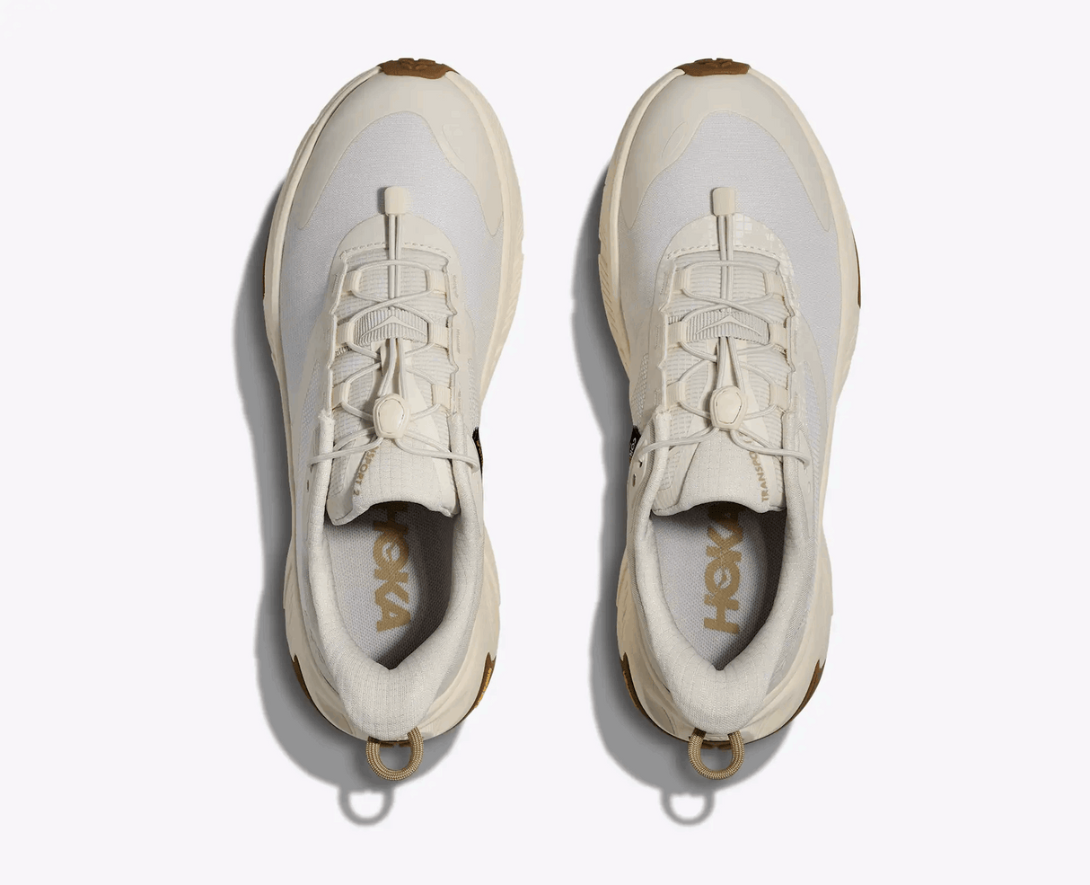 Explore HOKA Women Transport 2 Wide - Alabaster / Alabaster for trail, outdoor & lifestyle use | Liv Activ Singapore