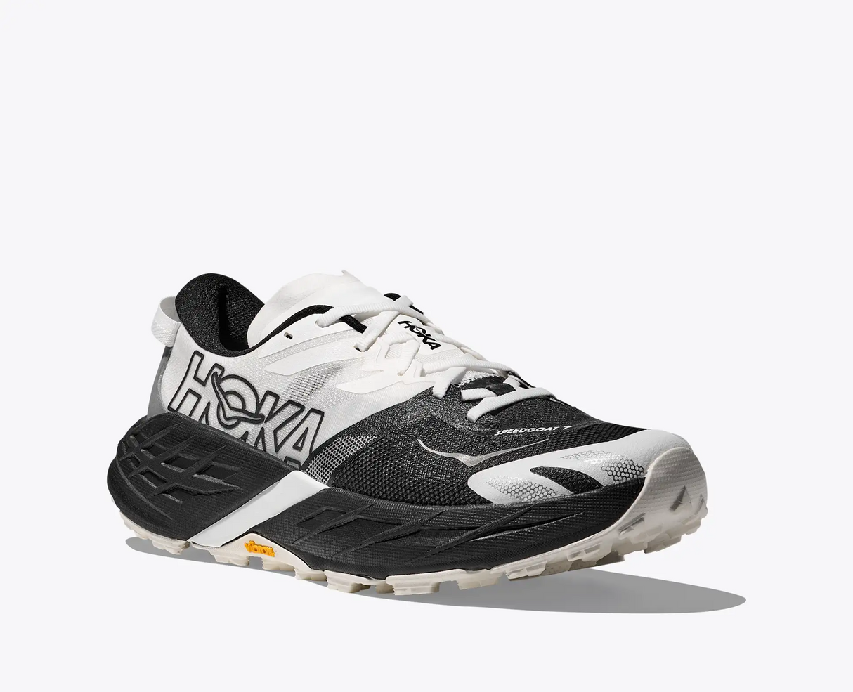 Explore HOKA Men Speedgoat 7 Wide - Black / White for trail, outdoor & lifestyle use | Liv Activ Singapore