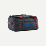 Explore Patagonia Black Hole® Duffel Bag 40L - Smolder Blue with Amanita Red for trail, outdoor & lifestyle use | Liv Activ Singapore