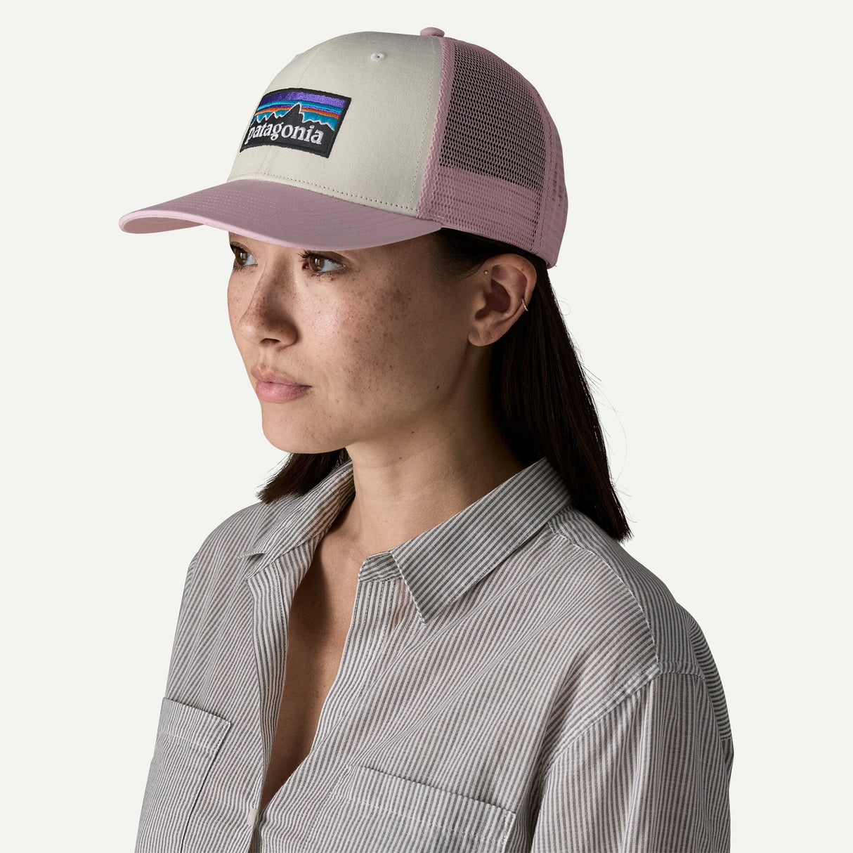 Explore Patagonia P-6 Logo Trucker Hat - White with Quiet Violet for trail, outdoor & lifestyle use | Liv Activ Singapore